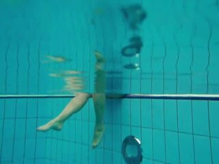 Enticing brunette Deniska underwater